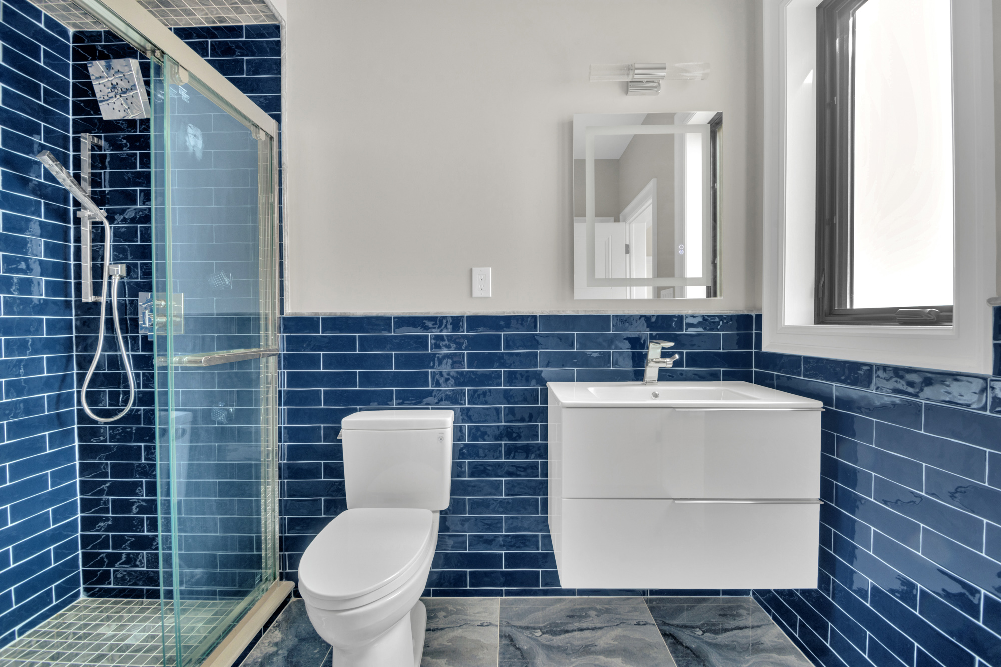 5 Osprey Court Staten Island, NY 10308 - Photo 36 of 50 a bathroom with a toilet a sink and mirror