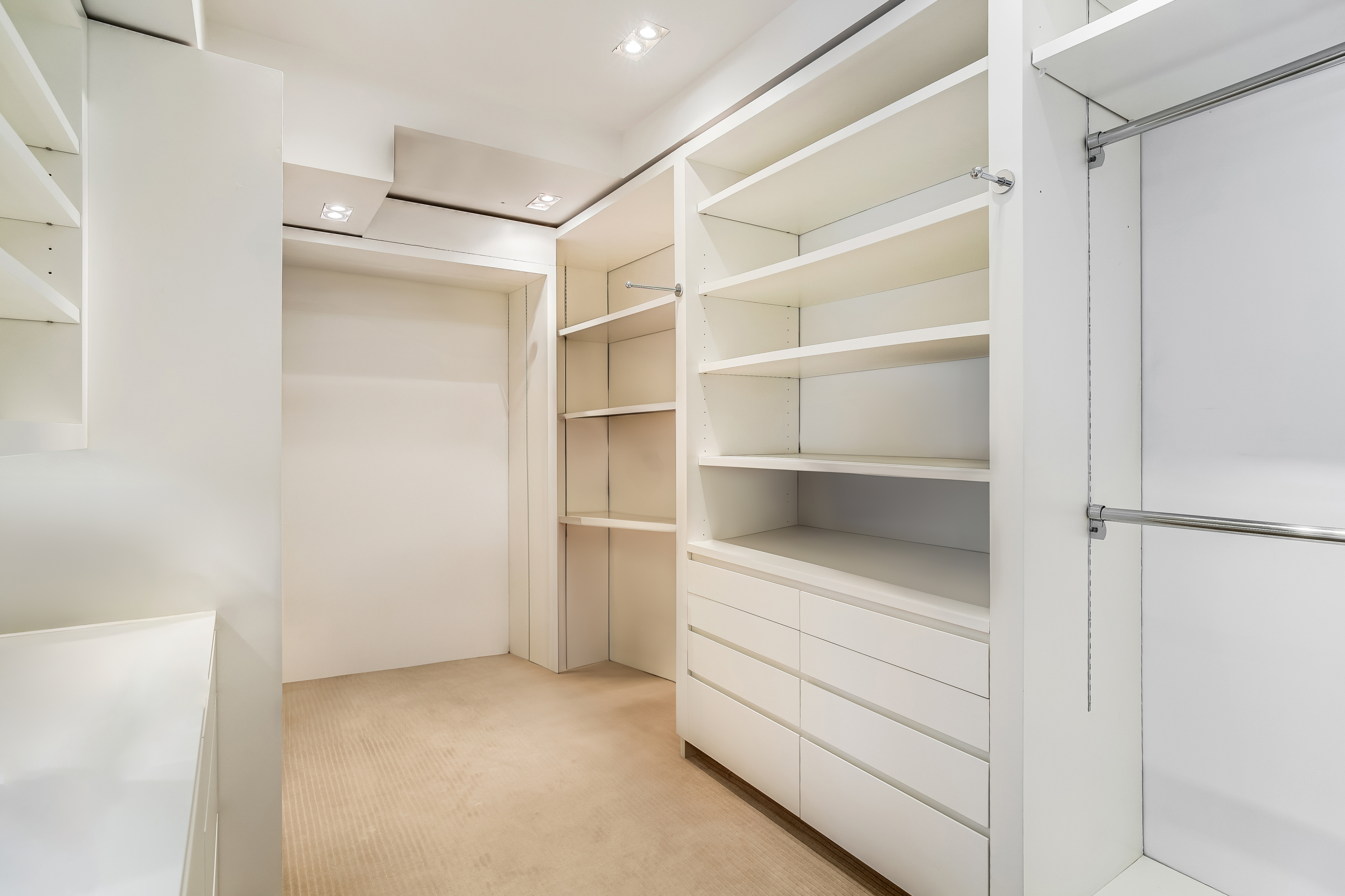 1 5th Avenue, Unit 5GH Manhattan, NY 10003 - Photo 17 of 26 a view of an empty walk in closet