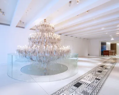 a view of a chandelier in big room