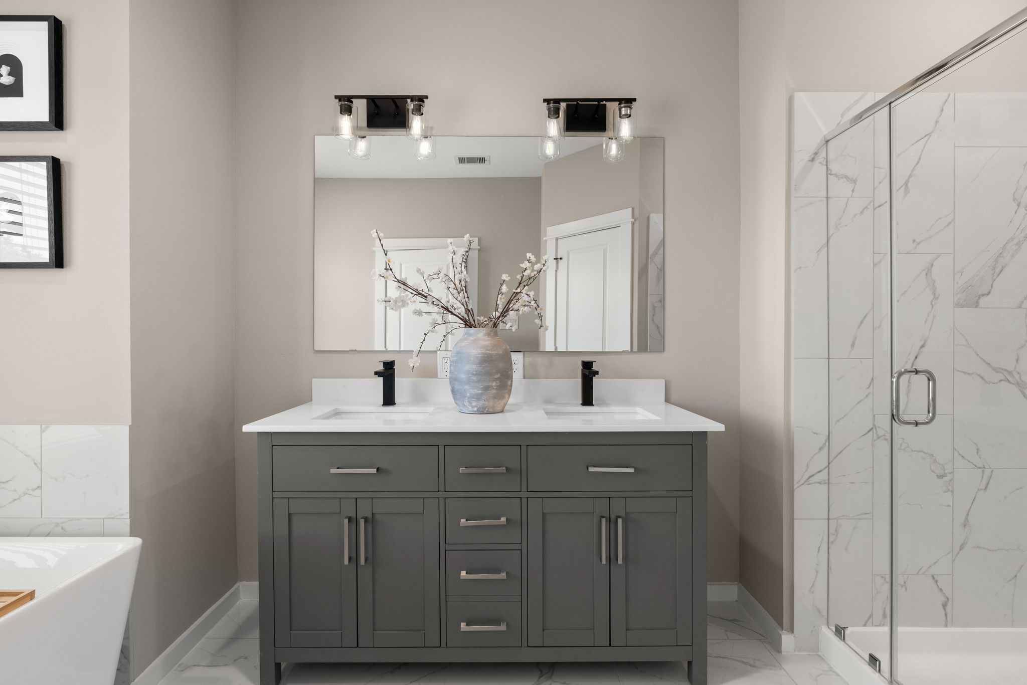 11303 Stonework Grv Lane Houston, TX 77076 - Photo 24 of 39 a bathroom with a granite countertop sink and a mirror