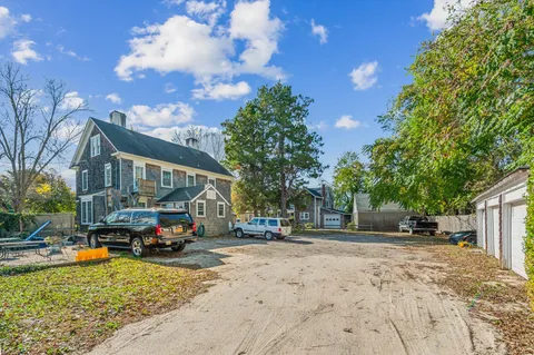 a view of a brick building with many windows