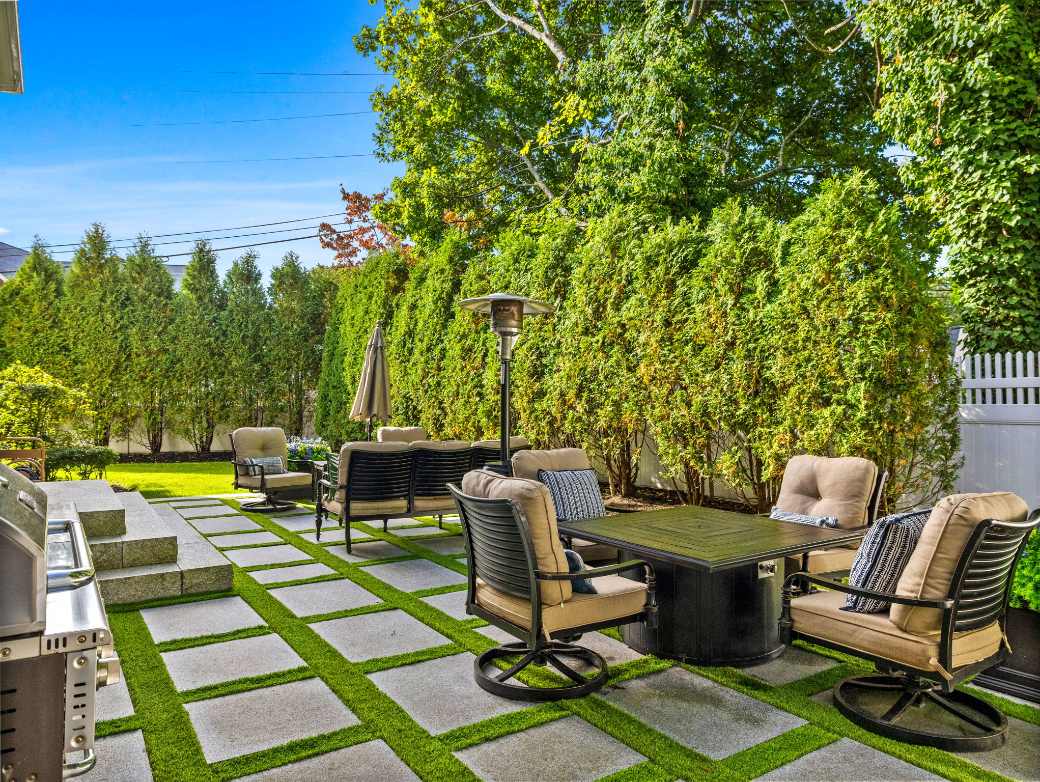 45 Washburn Avenue Needham, MA 02492 - Photo 19 of 23 a view of a chairs and table in a patio