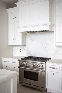 a bathroom with a shower and a mirror