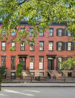 a front view of a building with street view