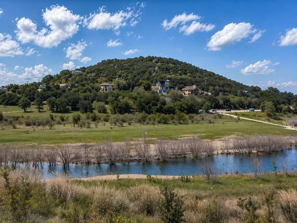 a view of a lake with a big yard