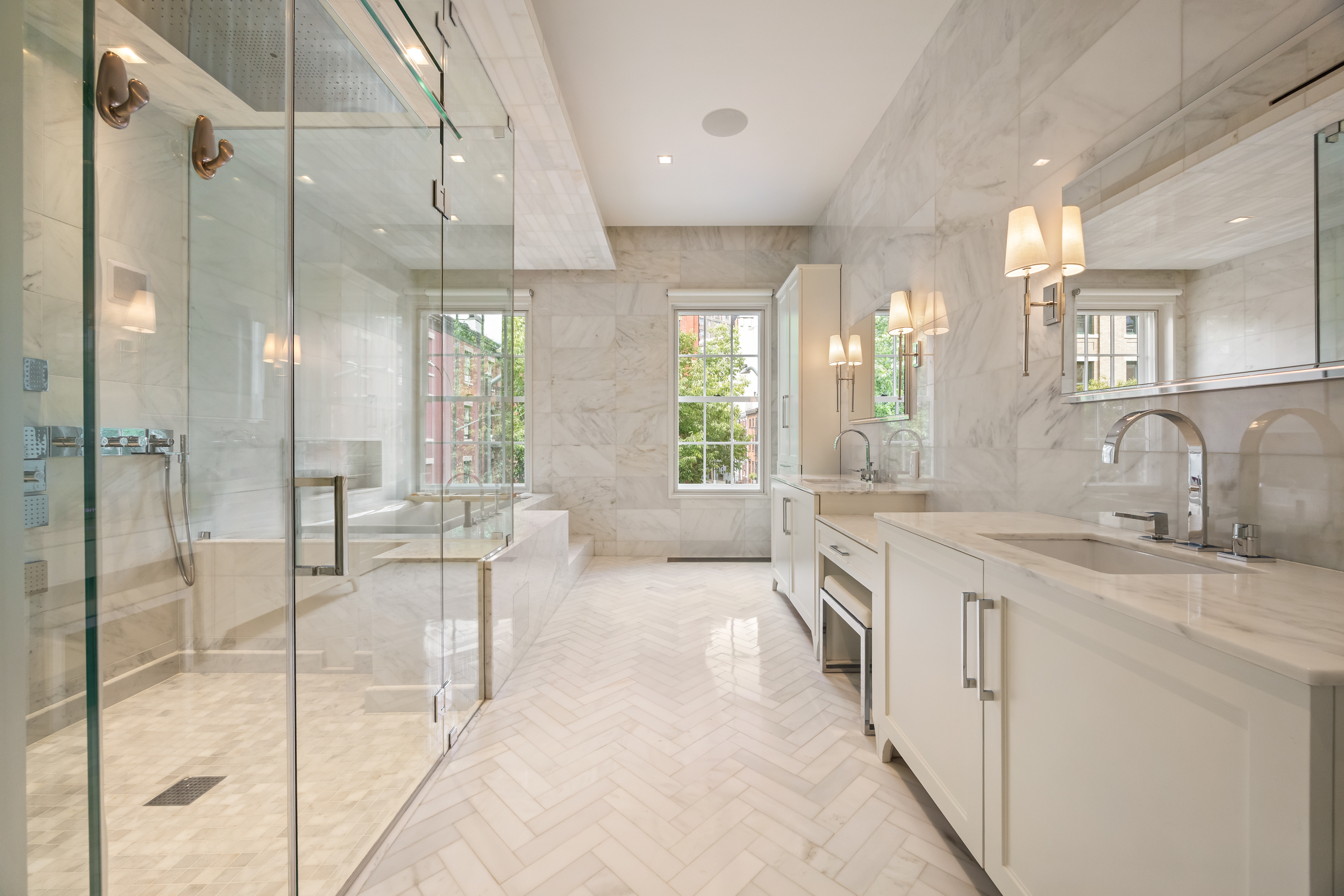 146 Waverly Place Manhattan, NY 10014 - Photo 23 of 41 a spacious bathroom with a granite countertop sink mirror and shower