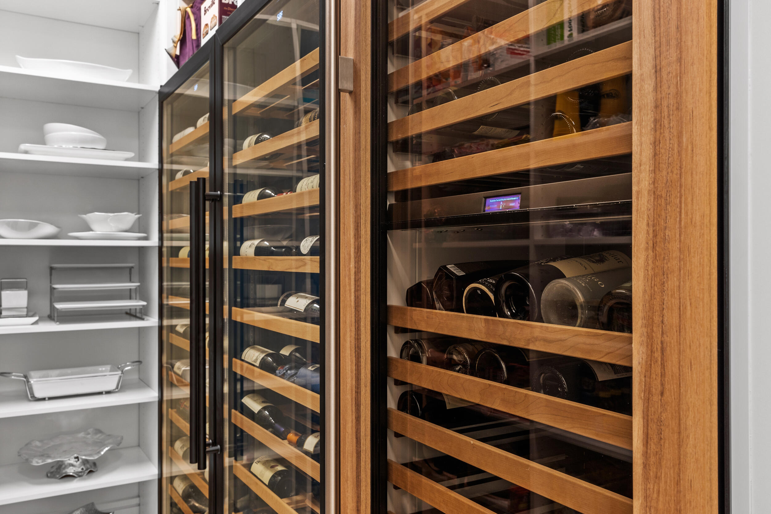 5695 Pennock Point Road Jupiter, FL 33458 - Photo 36 of 77 a view of walk in closet with clothes and shoes