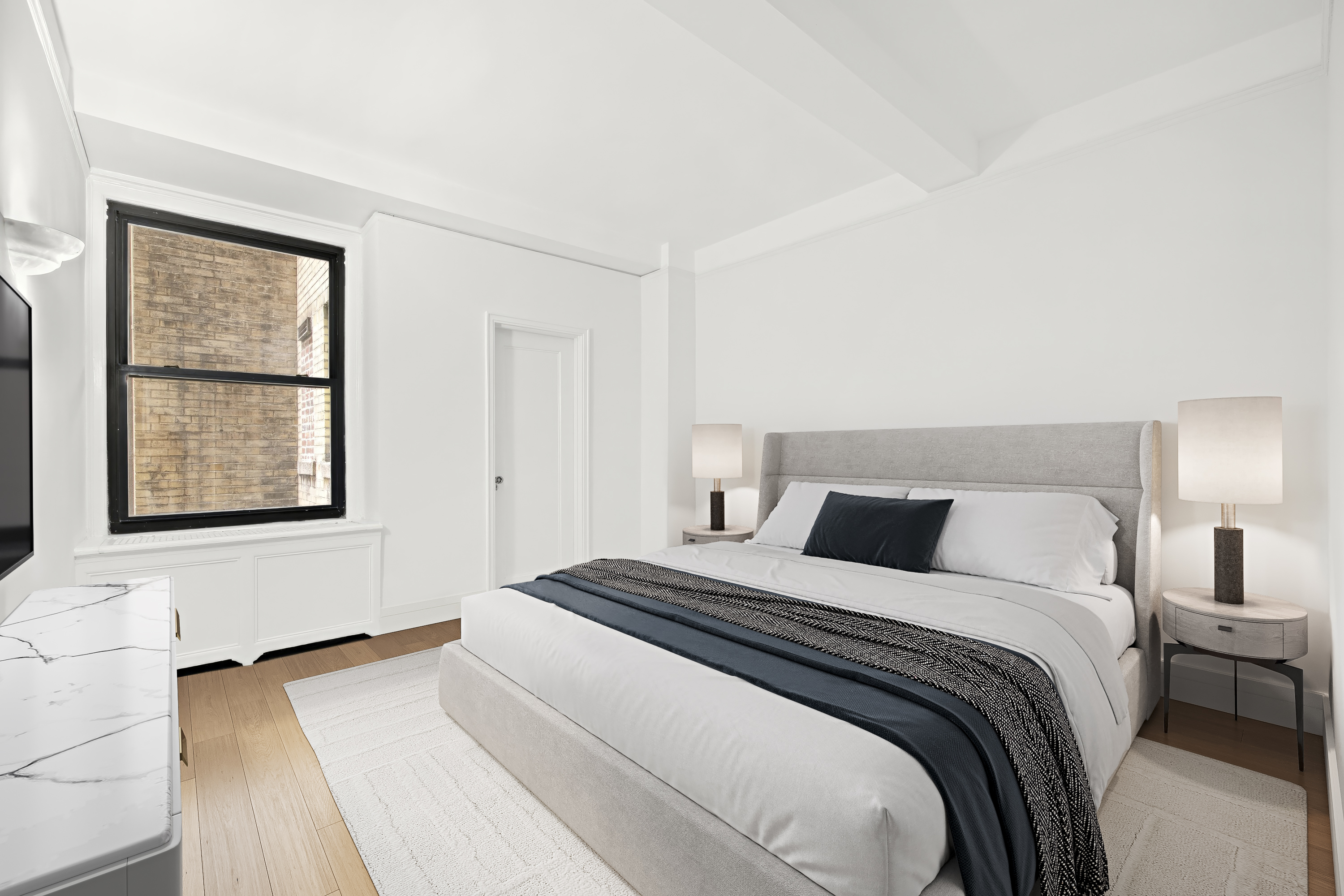 55 East 72nd Street, Unit 2NORTH Manhattan, NY 10021 - Photo 10 of 18 a bedroom with a bed and a window