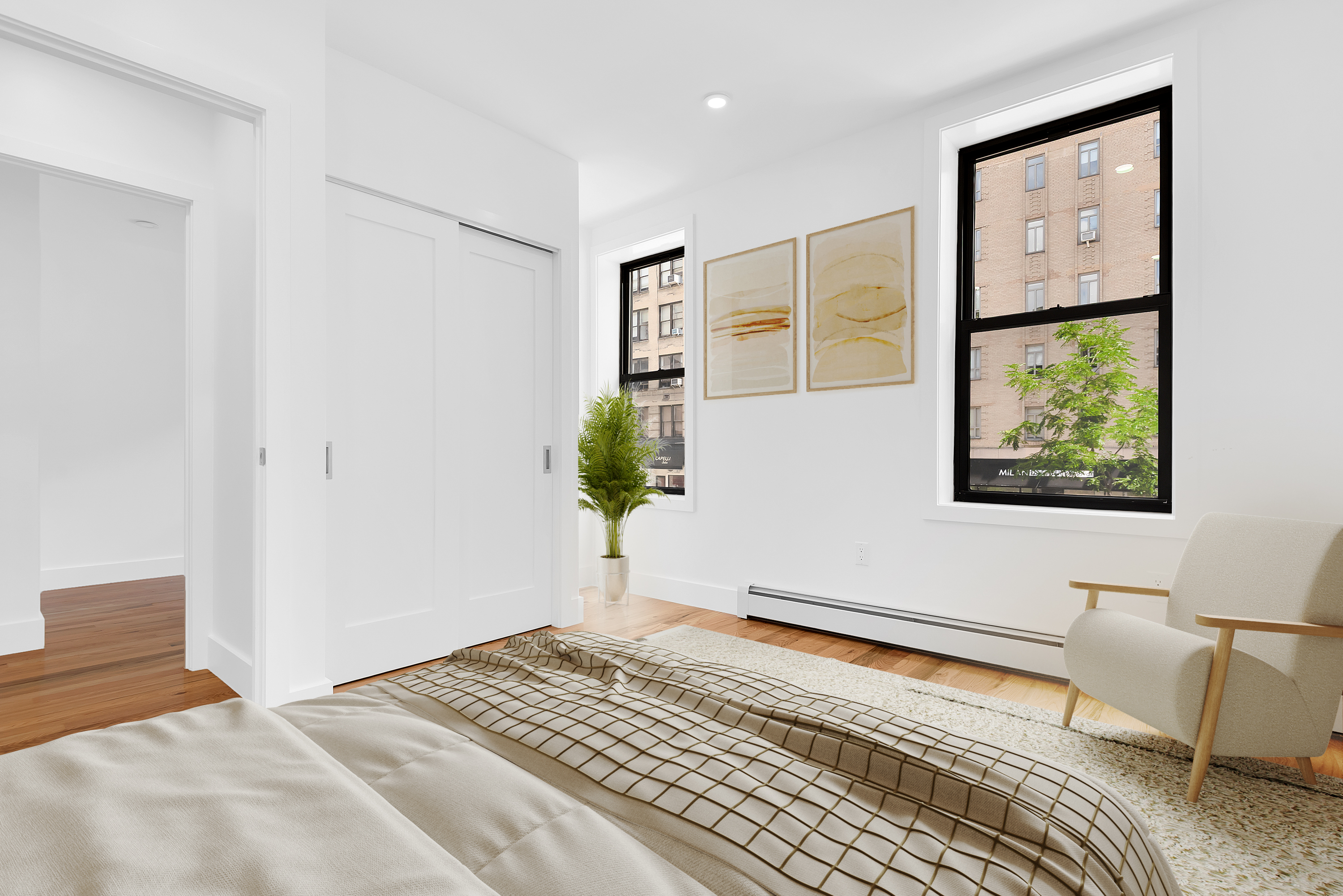 174 7th Avenue, Unit 3E Manhattan, NY 10011 - Photo 4 of 6 a bedroom with a bed and a window