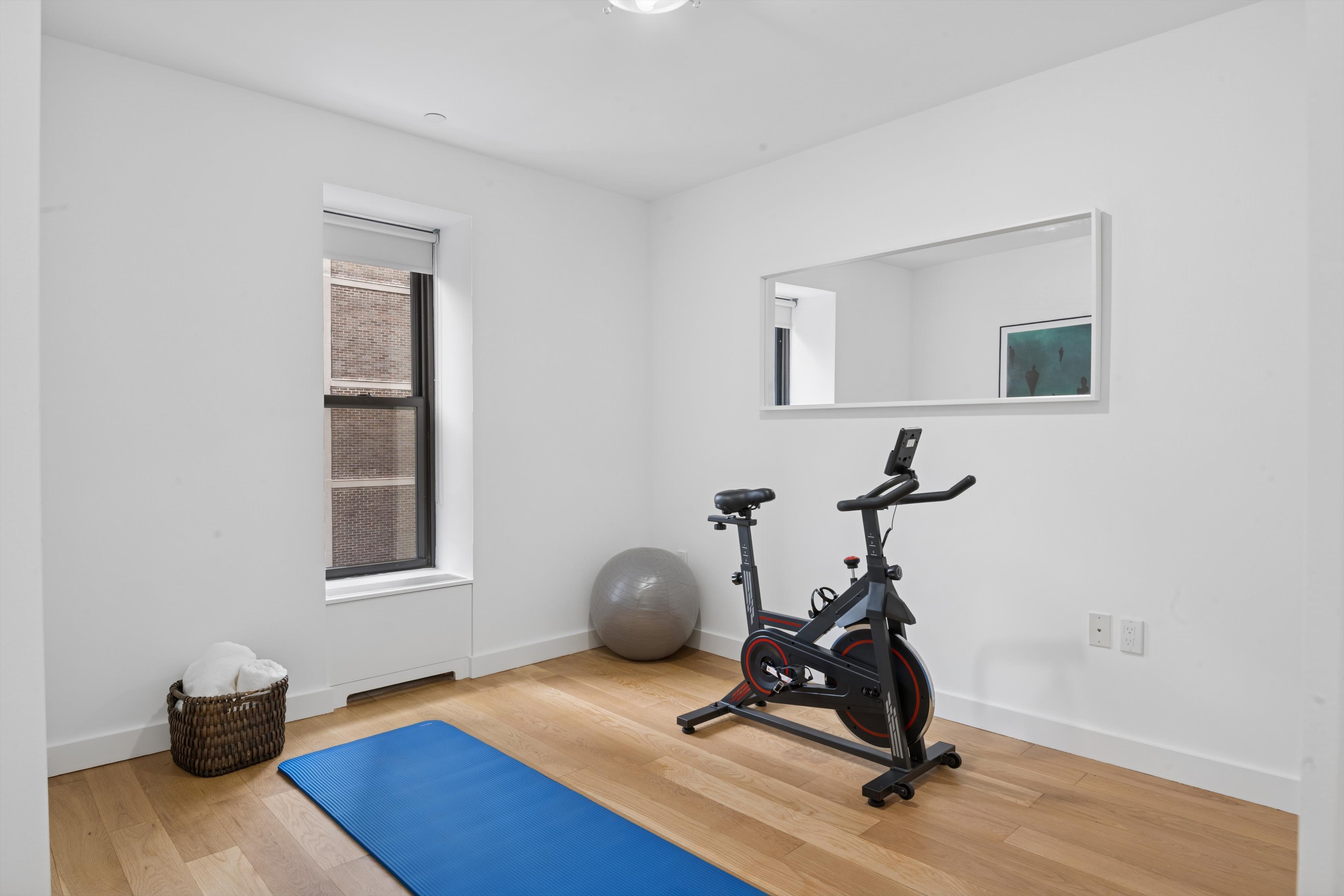 109 West 26th Street, Unit 9 Manhattan, NY 10001 - Photo 20 of 23 a view of a workspace with furniture and a window