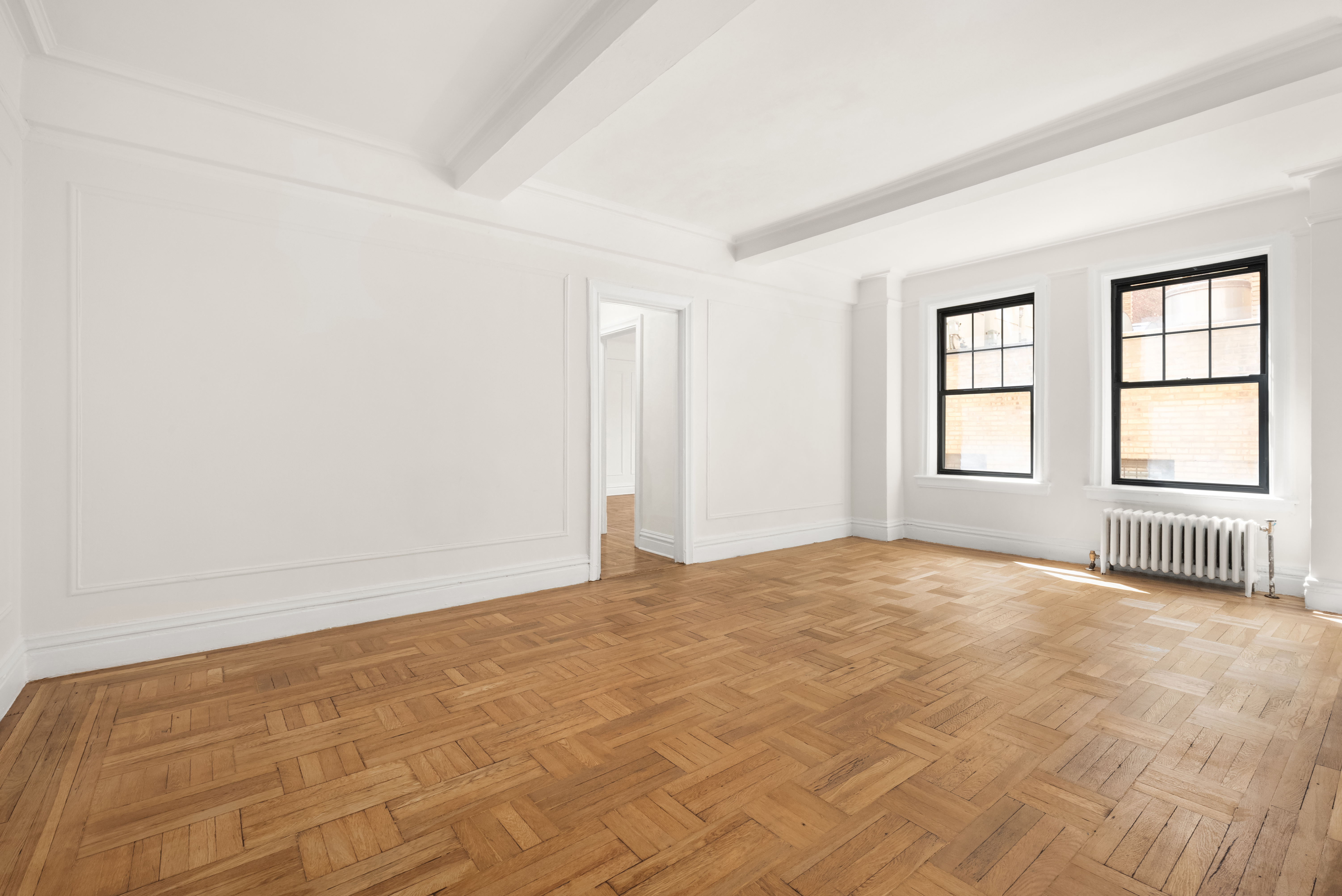 170 2nd Avenue, Unit 3E Manhattan, NY 10003 - Photo 2 of 12 a view of an empty room with a window
