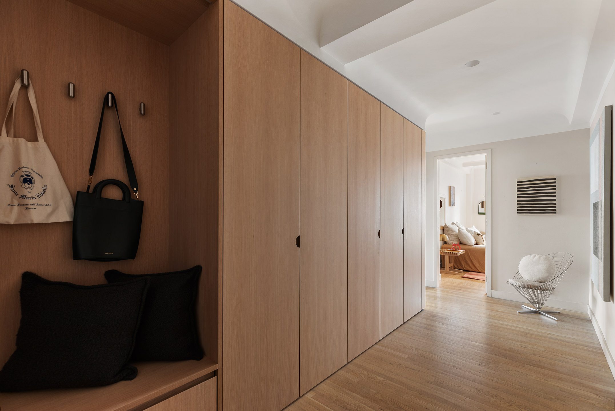 425 East 86th Street, Unit 11E Manhattan, NY 10028 - Photo 16 of 19 a living room with furniture and a wooden floor