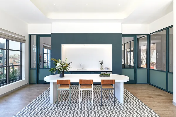 160 Front Street, Unit 517 Brooklyn, NY 11201 - Photo 9 of 14 a dining room with furniture and wooden floor