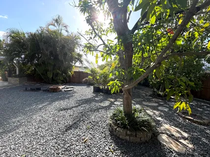 a backyard of a house with lots of green space