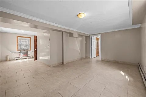 a bathroom with a toilet a sink and shower