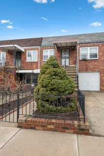 front view of a house and a yard