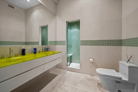 a bathroom with a bathtub and a toilet