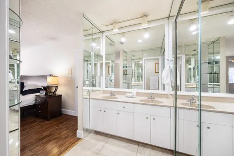 a kitchen with a sink and a refrigerator