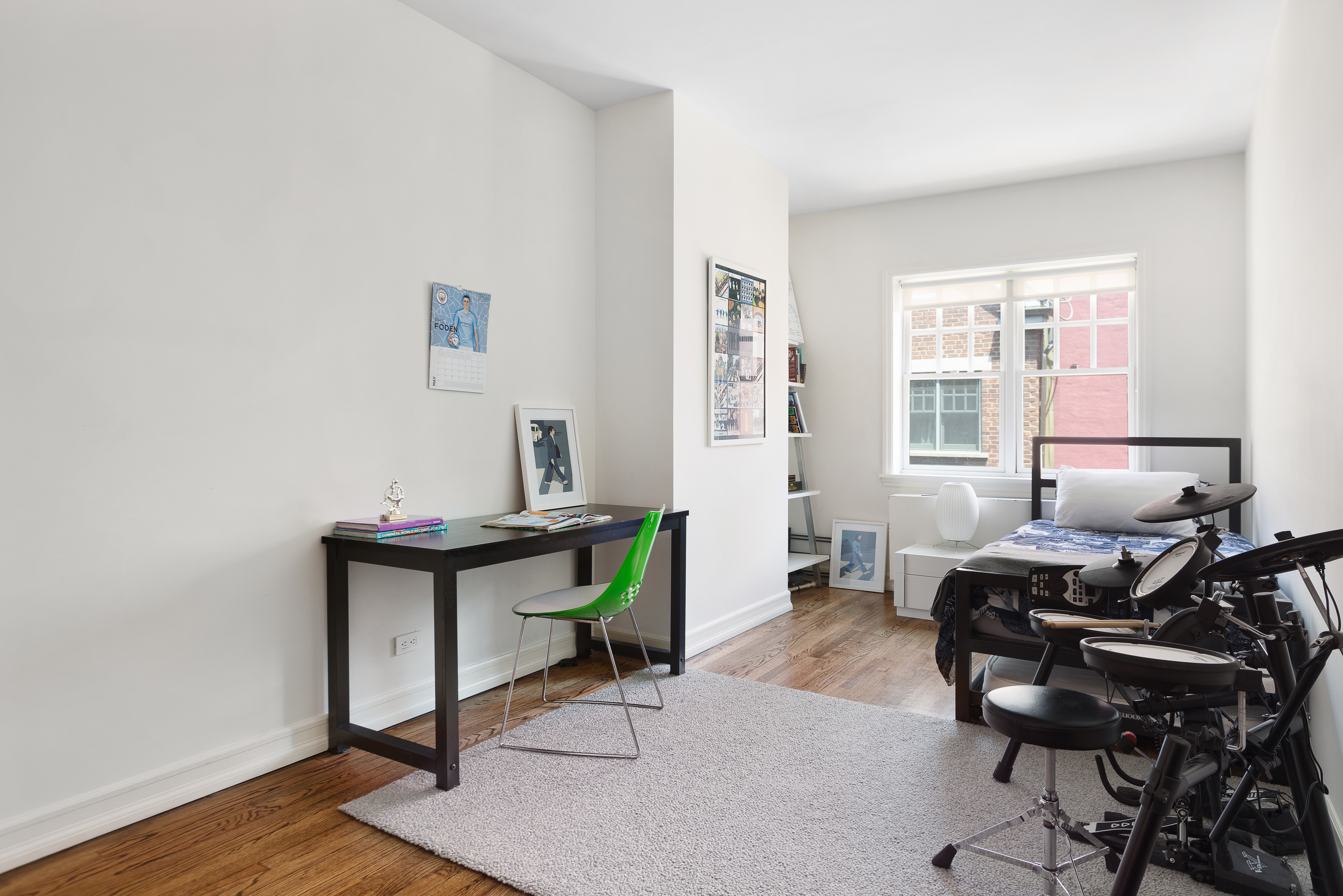 687 Greenwich Street, Unit TH7 Manhattan, NY 10014 - Photo 15 of 23 a workspace with furniture and a window