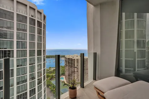 a view of balcony with wooden floor