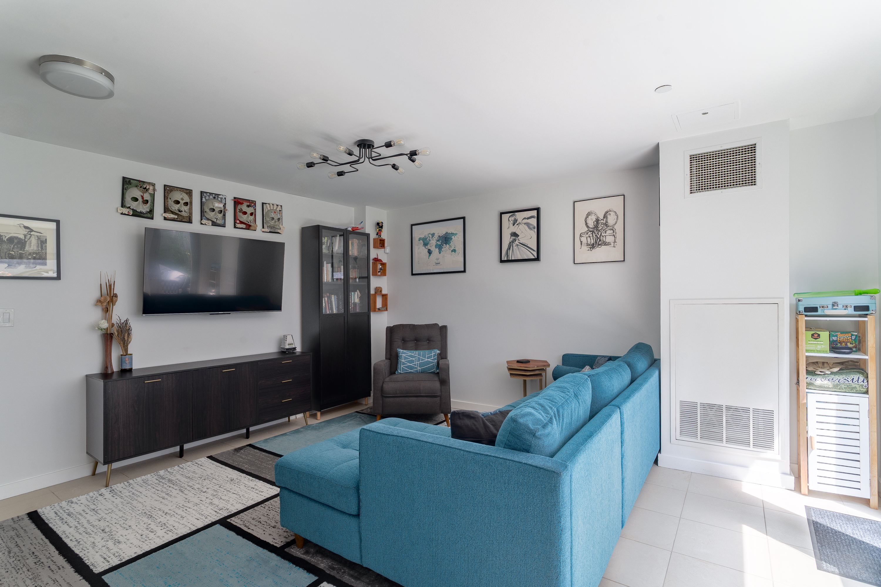 560 Carroll Street, Unit 1D Brooklyn, NY 11215 - Photo 12 of 19 a living room with furniture and a flat screen tv