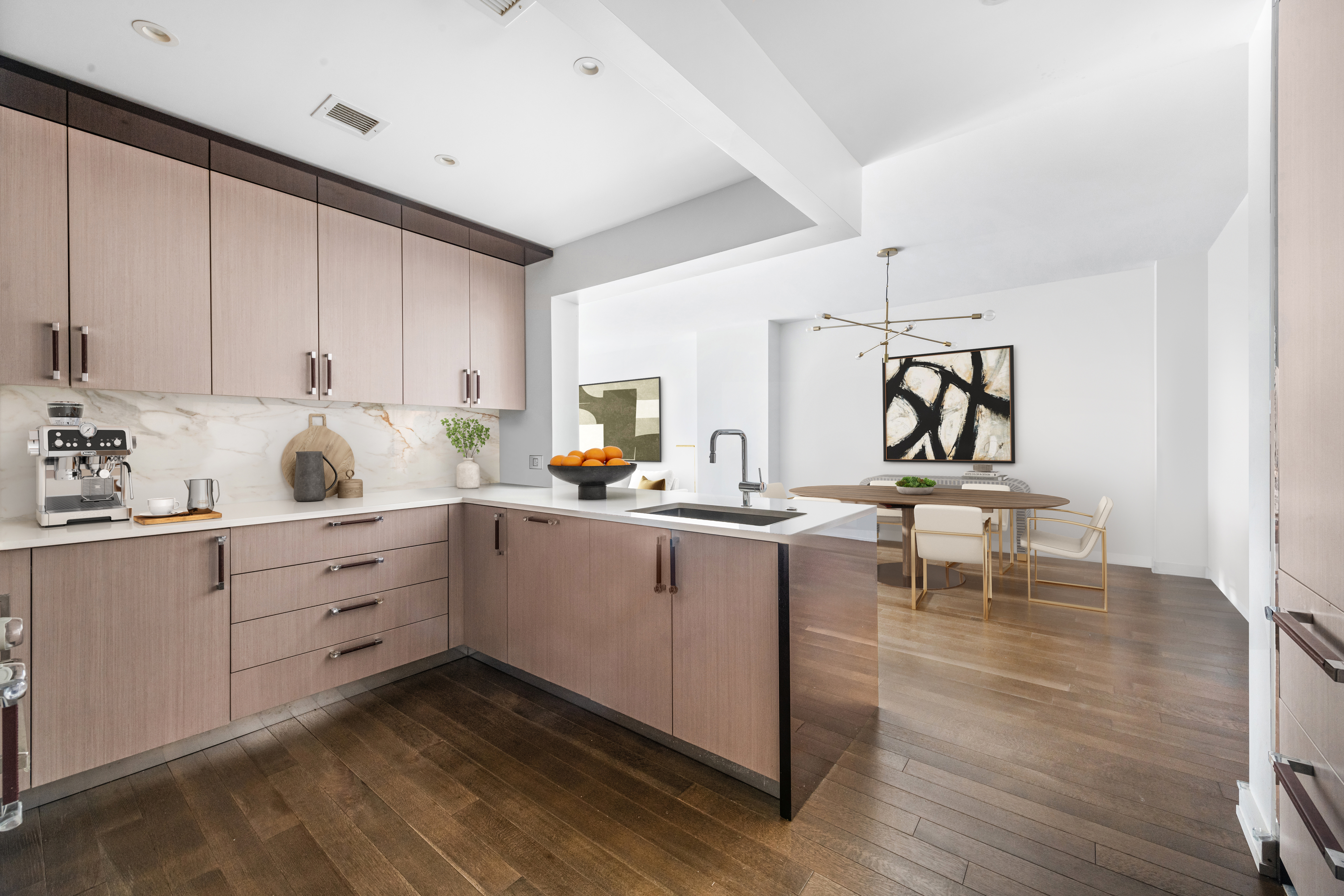 261 West 25th Street, Unit 4D Manhattan, NY 10001 - Photo 4 of 14 a kitchen with cabinets and window