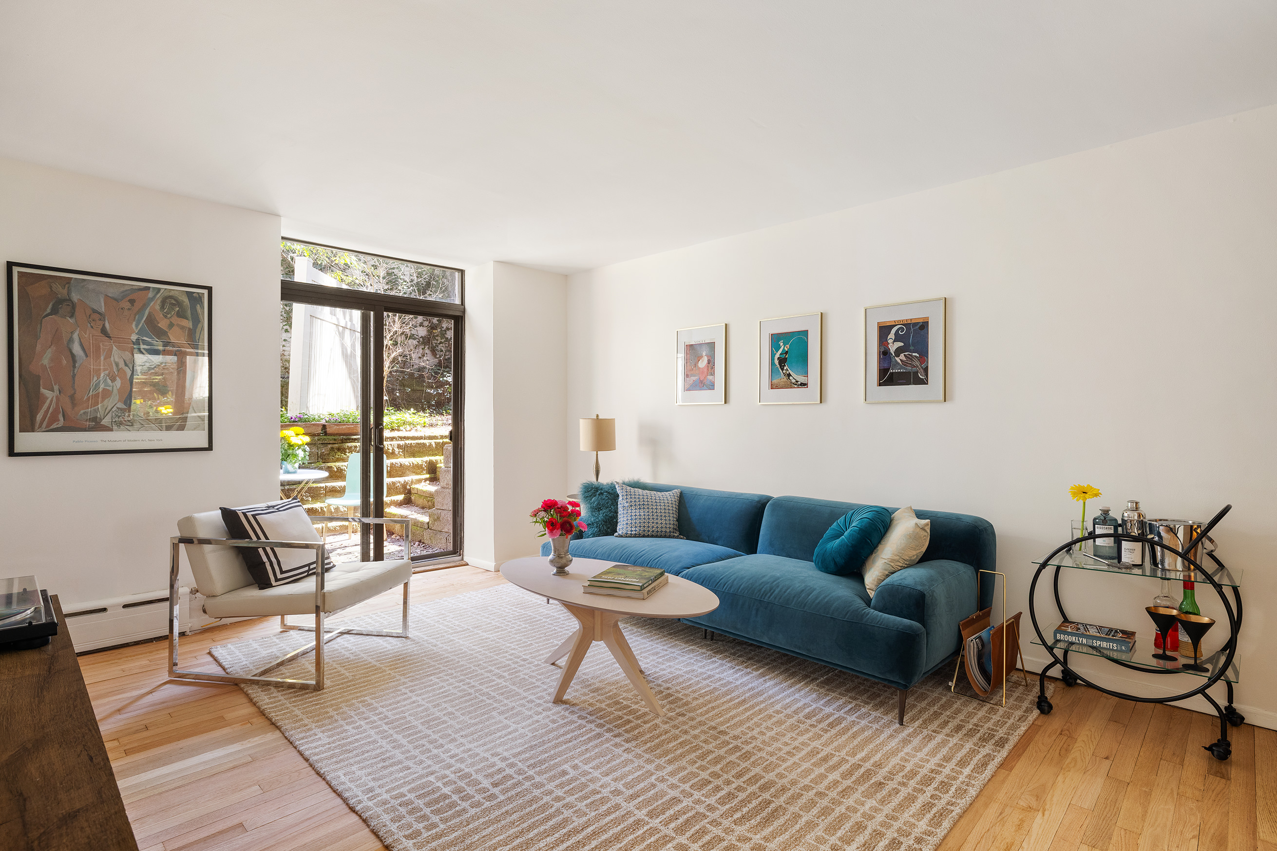 195 Garfield Place, Unit 1L Brooklyn, NY 11215 - Photo 4 of 17 a living room with furniture and a window