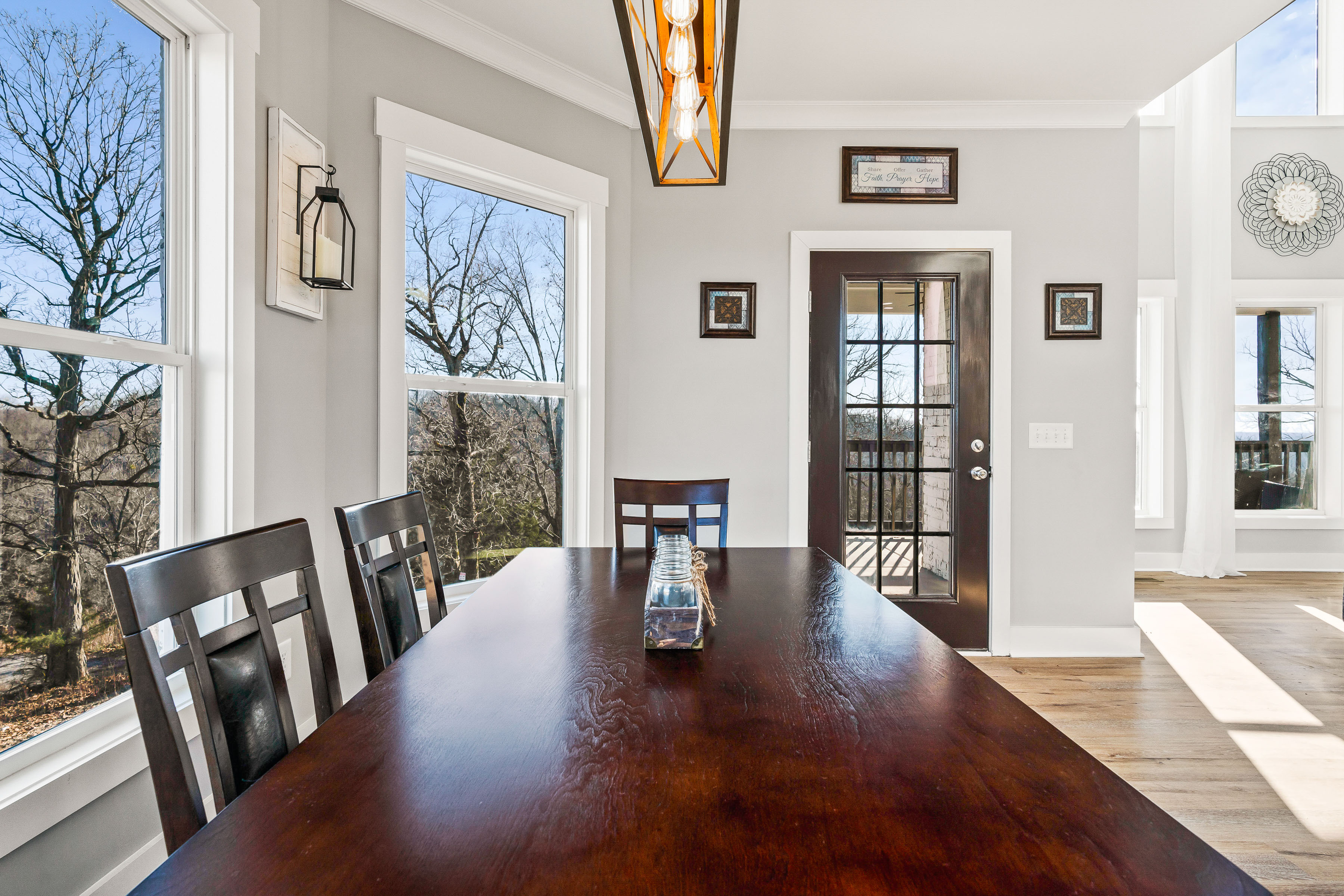 Happy Hollow Road Goodlettsville, TN 37072 - Photo 43 of 203 a view of a hallway with wooden floor and dining room