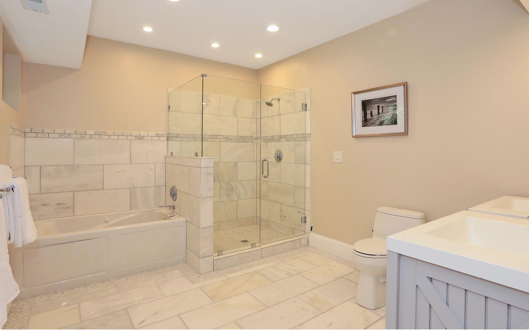 Alpine Street Roxbury, MA 02119 - Photo 7 of 8 a bathroom with a shower and a toilet