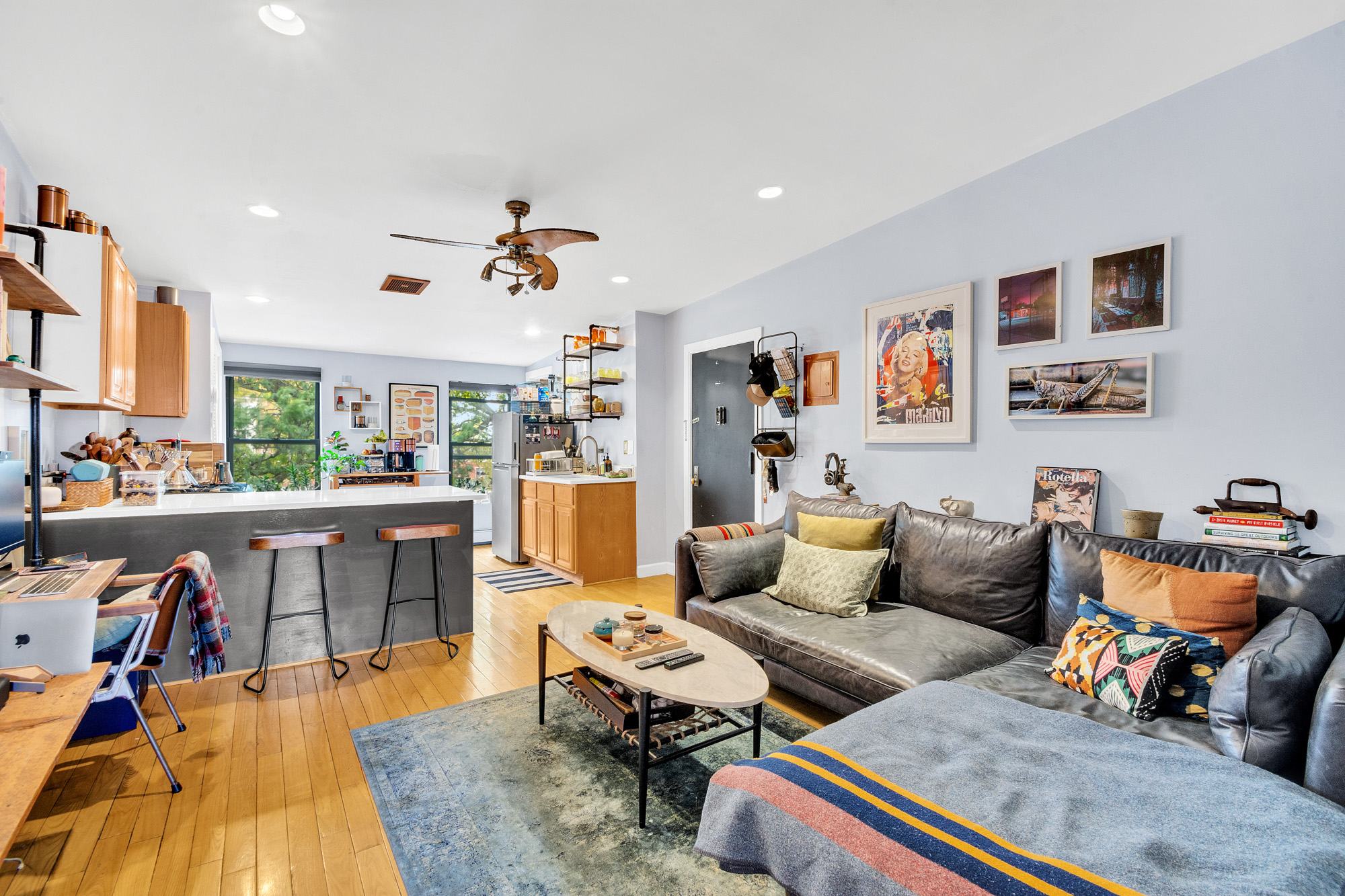 10 Carroll Street Brooklyn, NY 11231 - Photo 18 of 28 a living room with furniture kitchen view and a large window