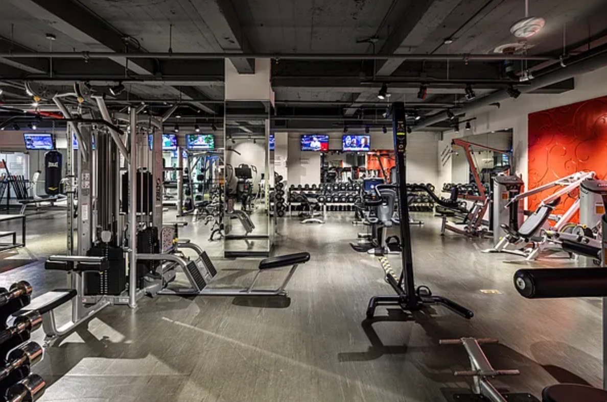 88 Greenwich Street, Unit 1014 Manhattan, NY 10006 - Photo 9 of 14 a view of a room with gym equipment