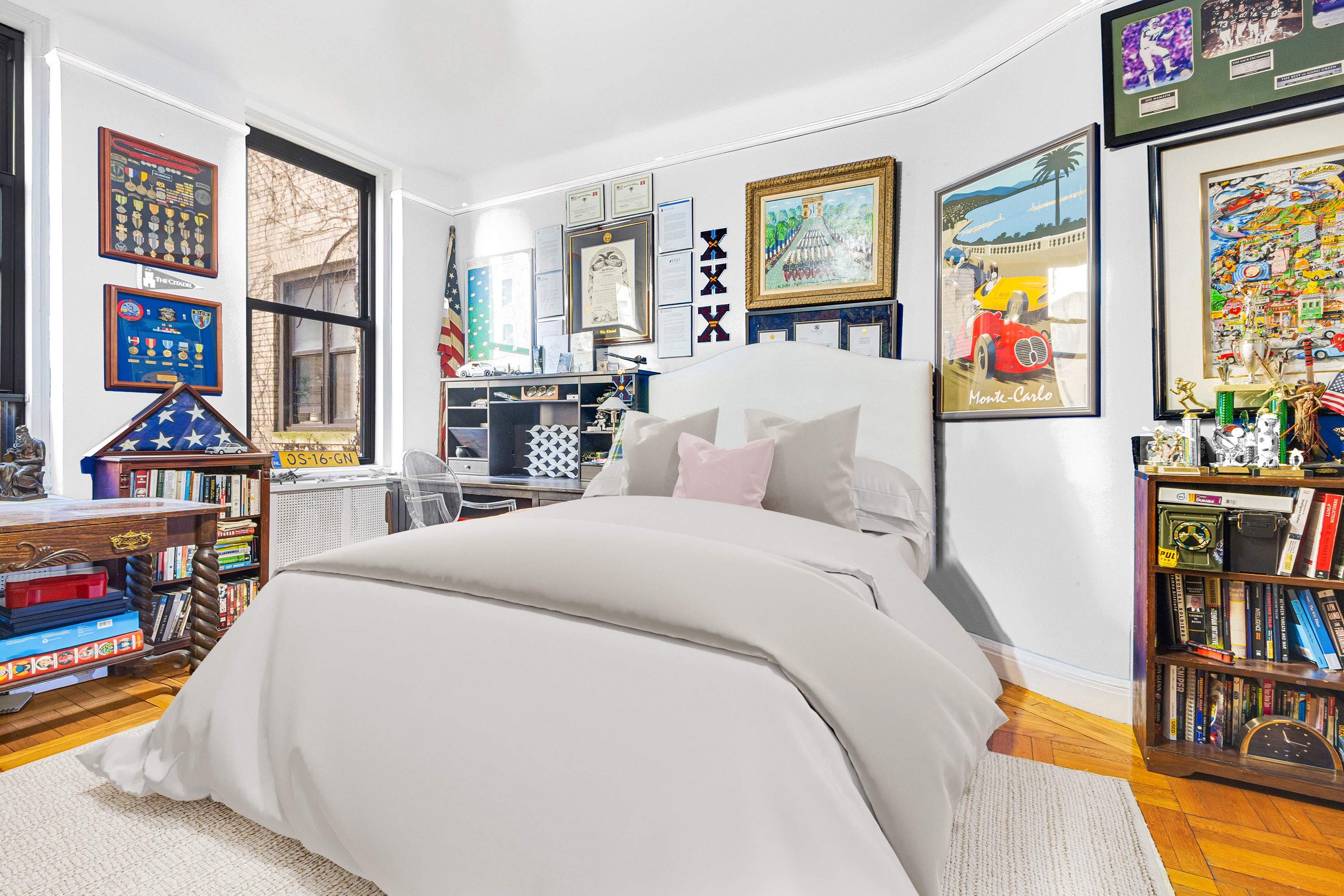 205 West 89th Street, Unit 6RS Manhattan, NY 10024 - Photo 9 of 19 a bed room with a bed and a book shelf