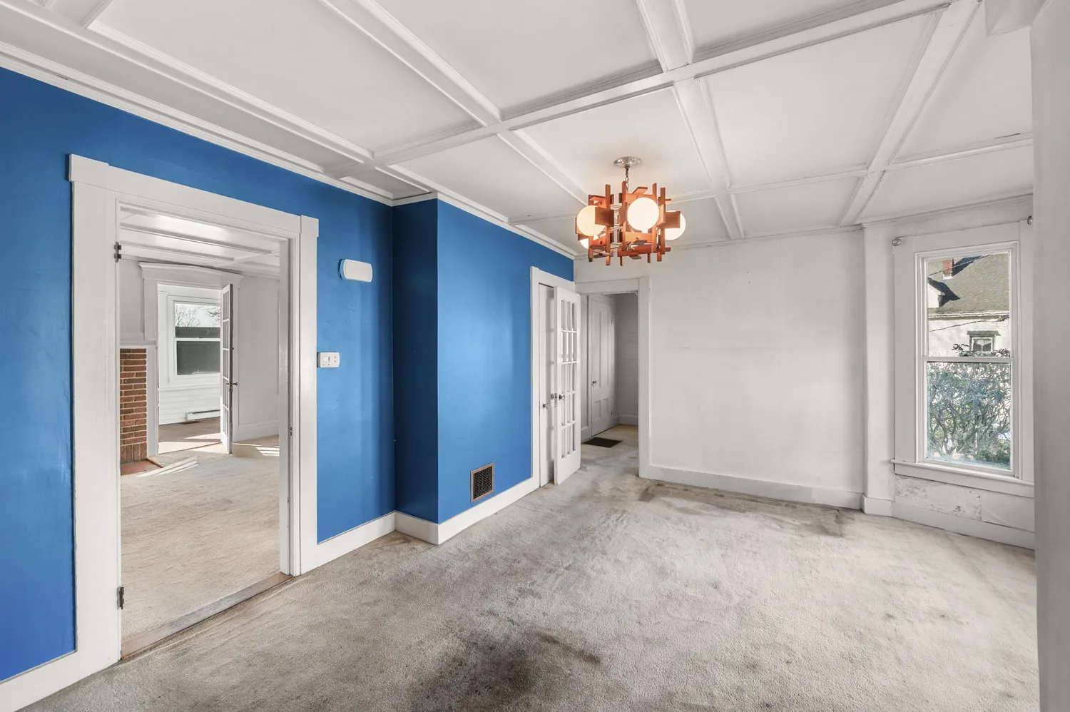 a bathroom with a sink a toilet and shower curtain