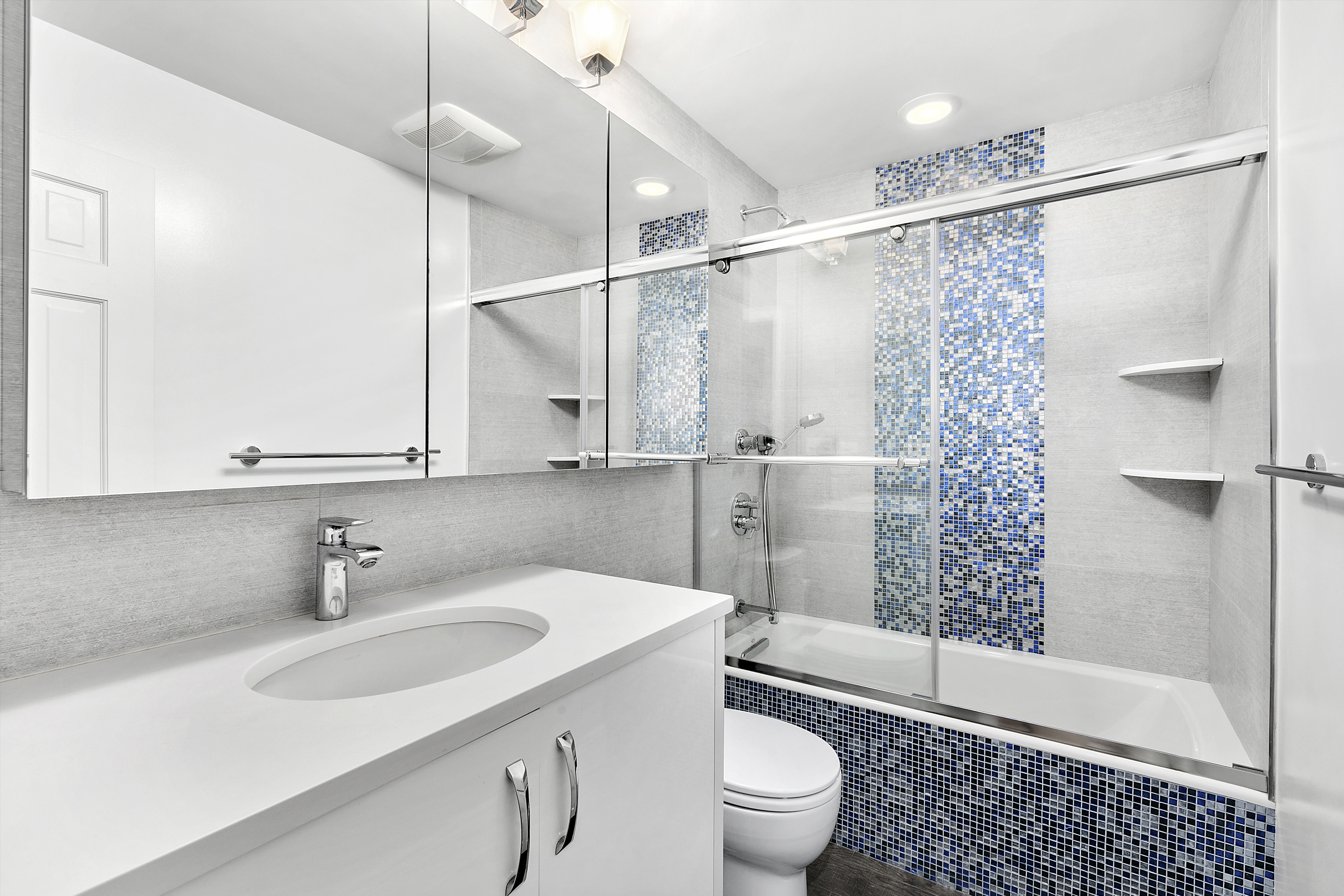 255 West 95th Street, Unit 1B Manhattan, NY 10025 - Photo 5 of 12 a bathroom with a sink toilet and shower