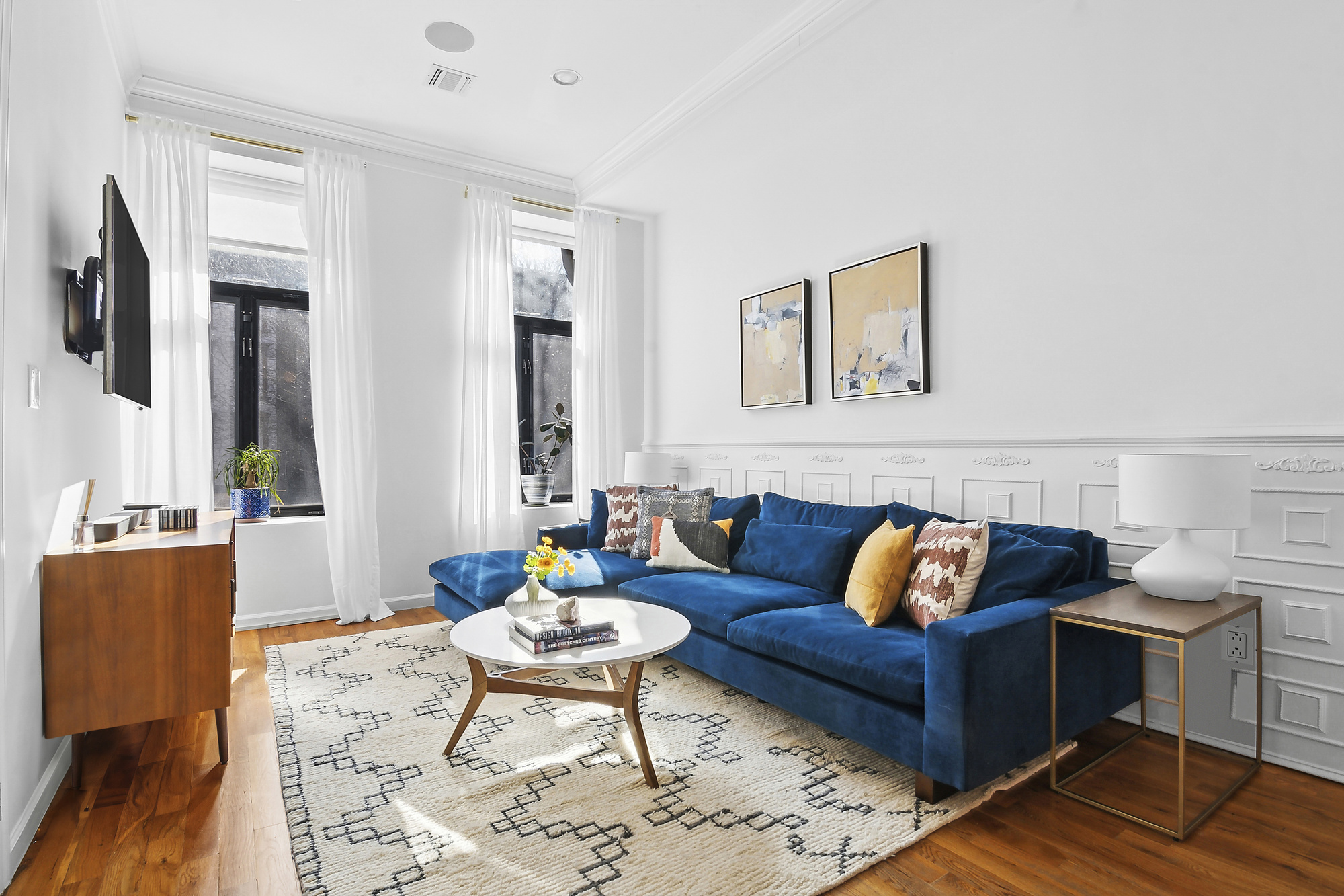147 Herkimer Street Brooklyn, NY 11216 - Photo 2 of 25 a living room with furniture and wooden floor