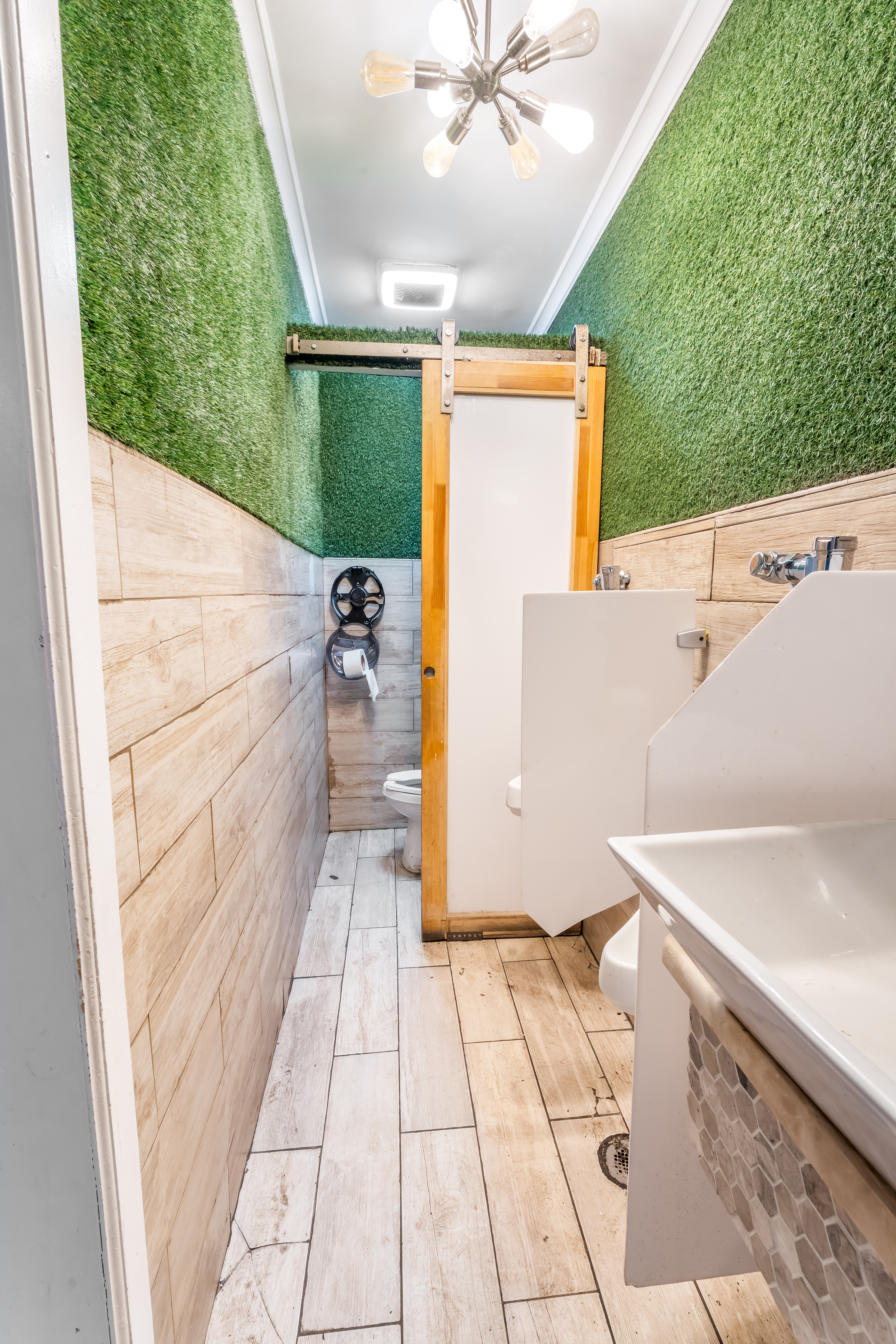 646 Newark Avenue, Unit COMMERCIAL Jersey City, NJ 07306 - Photo 12 of 35 a view of a bathroom with a sink