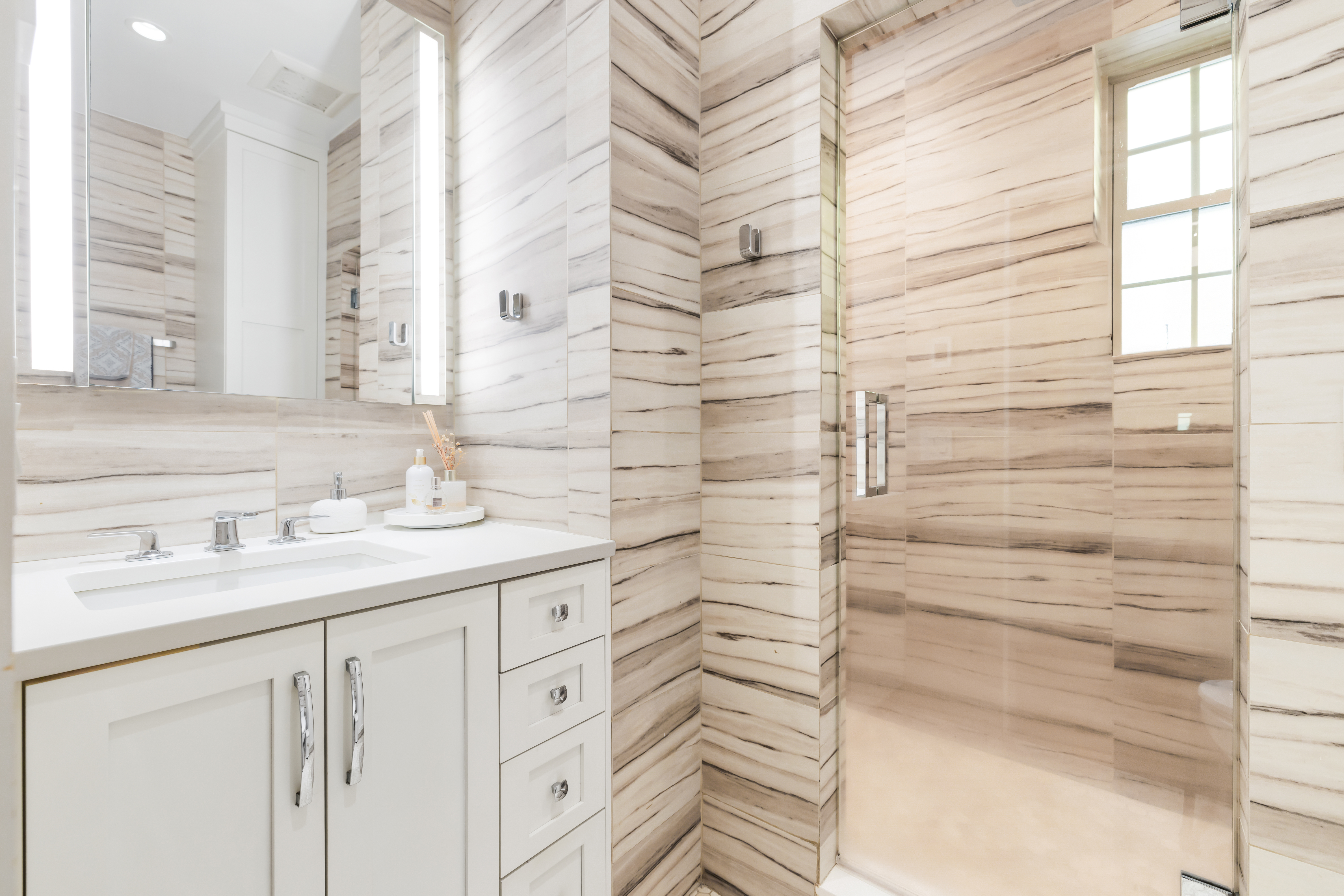 1490 Beacon Street, Unit 4 Brookline, MA 02446 - Photo 14 of 20 a bathroom with a sink and a shower