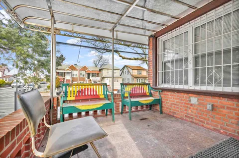 a view of a chairs in the patio