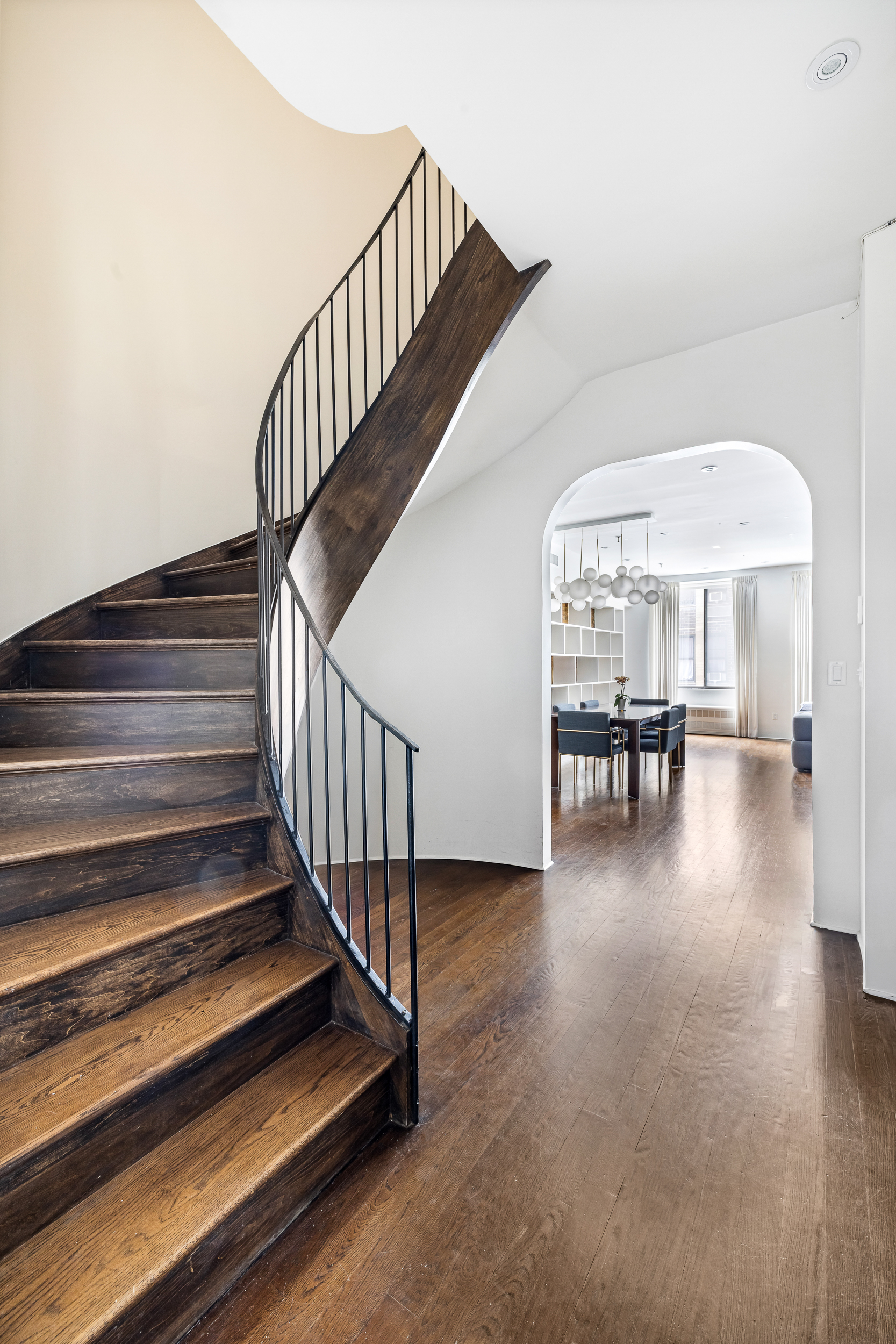 240 West 23rd Street, Unit 3/4C Manhattan, NY 10011 - Photo 5 of 13 a view of entryway and hall with wooden floor