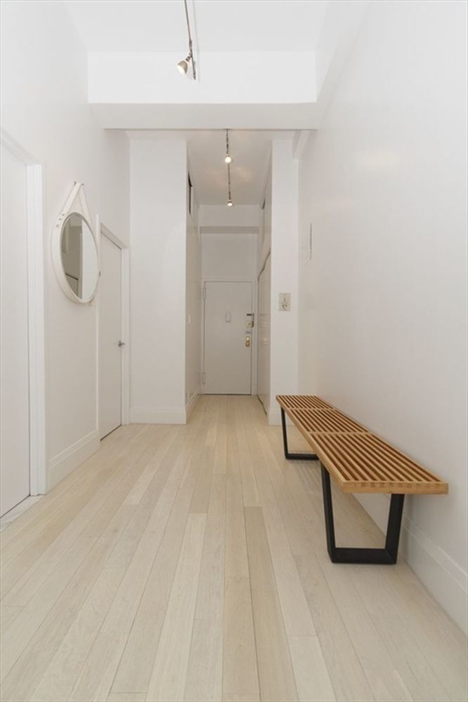 315 7th Avenue, Unit 6A Manhattan, NY 10001 - Photo 4 of 10 a view of room with stairs and closet