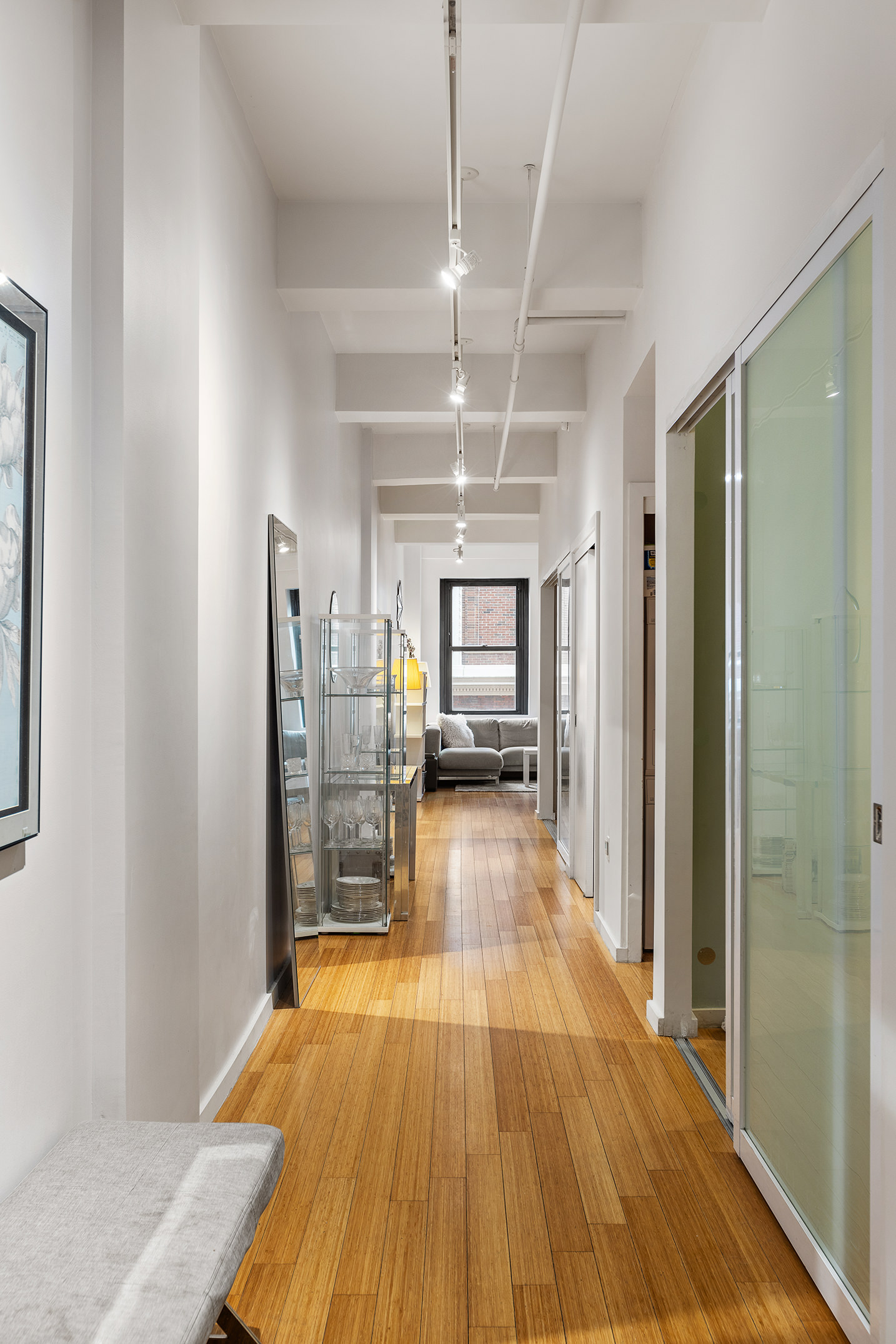 365 Bridge Street, Unit 8I Brooklyn, NY 11201 - Photo 2 of 10 a view of a room with wooden floor
