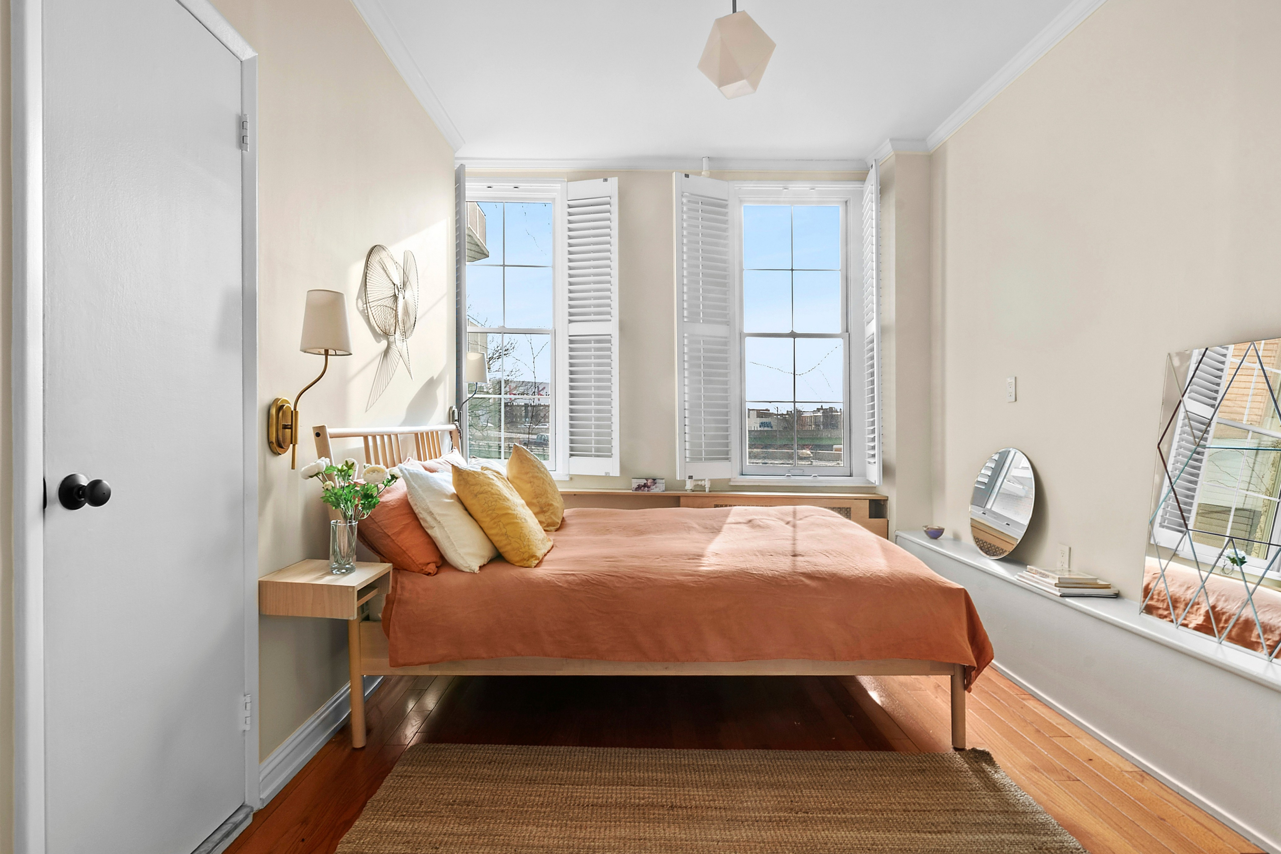 98 Luquer Street, Unit 2R Brooklyn, NY 11231 - Photo 6 of 9 a bedroom with a bed and wooden floor