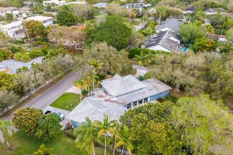an aerial view of a house with a garden