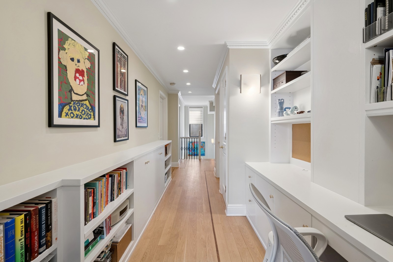 514 West End Avenue, Unit 8/9A Manhattan, NY 10024 - Photo 15 of 24 a hallway with painting on the wall and a large window