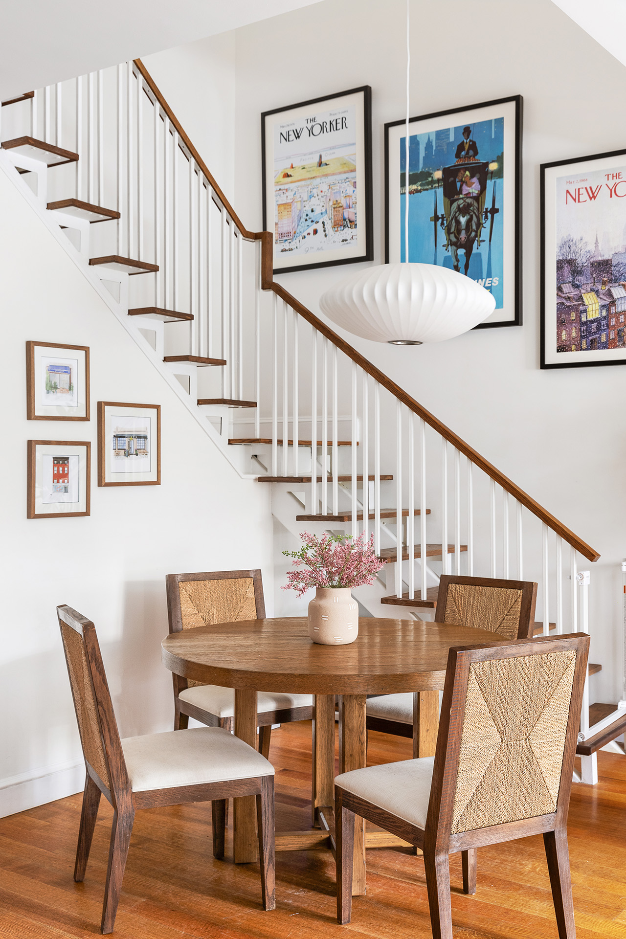 58 Strong Place, Unit 1D Brooklyn, NY 11231 - Photo 3 of 11 a view of a dining room with furniture a rug and wooden floor