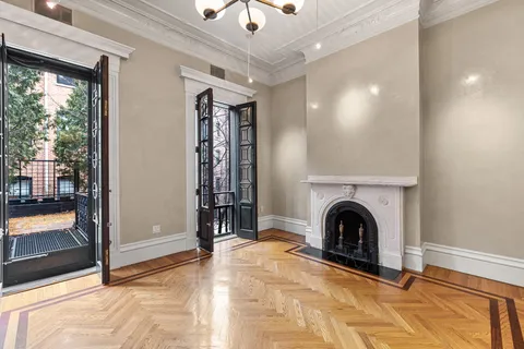 a view of livingroom with furniture and a fireplace
