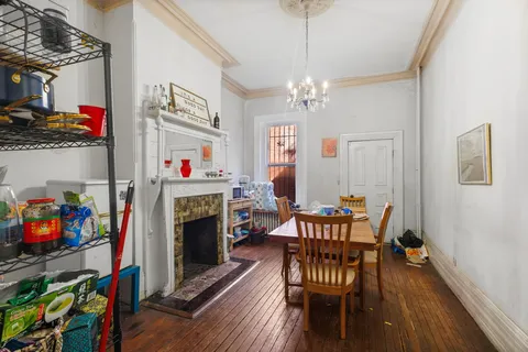 a kitchen with a stove a sink and a microwave