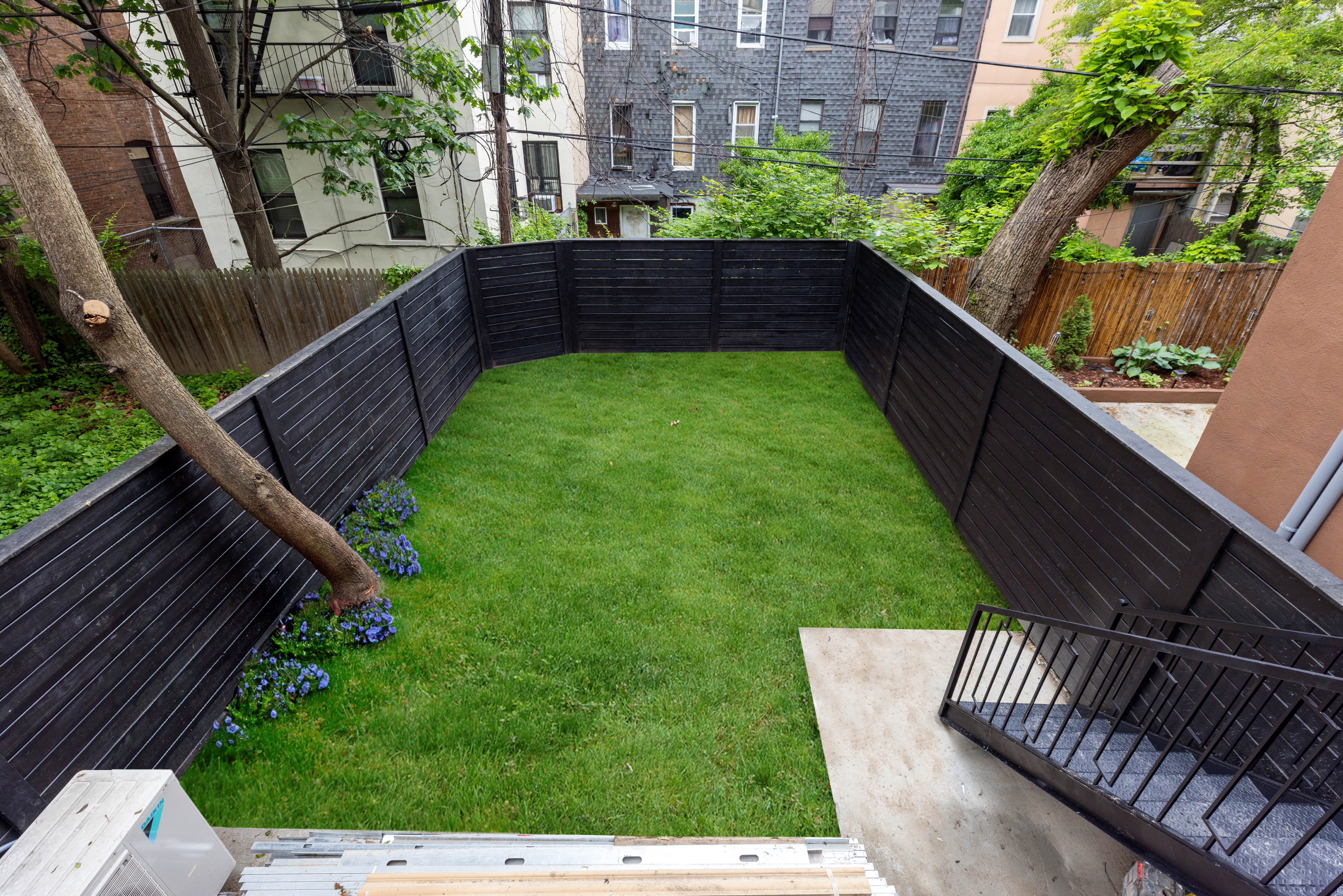757 Putnam Avenue Brooklyn, NY 11221 - Photo 23 of 25 a view of a backyard with sitting area