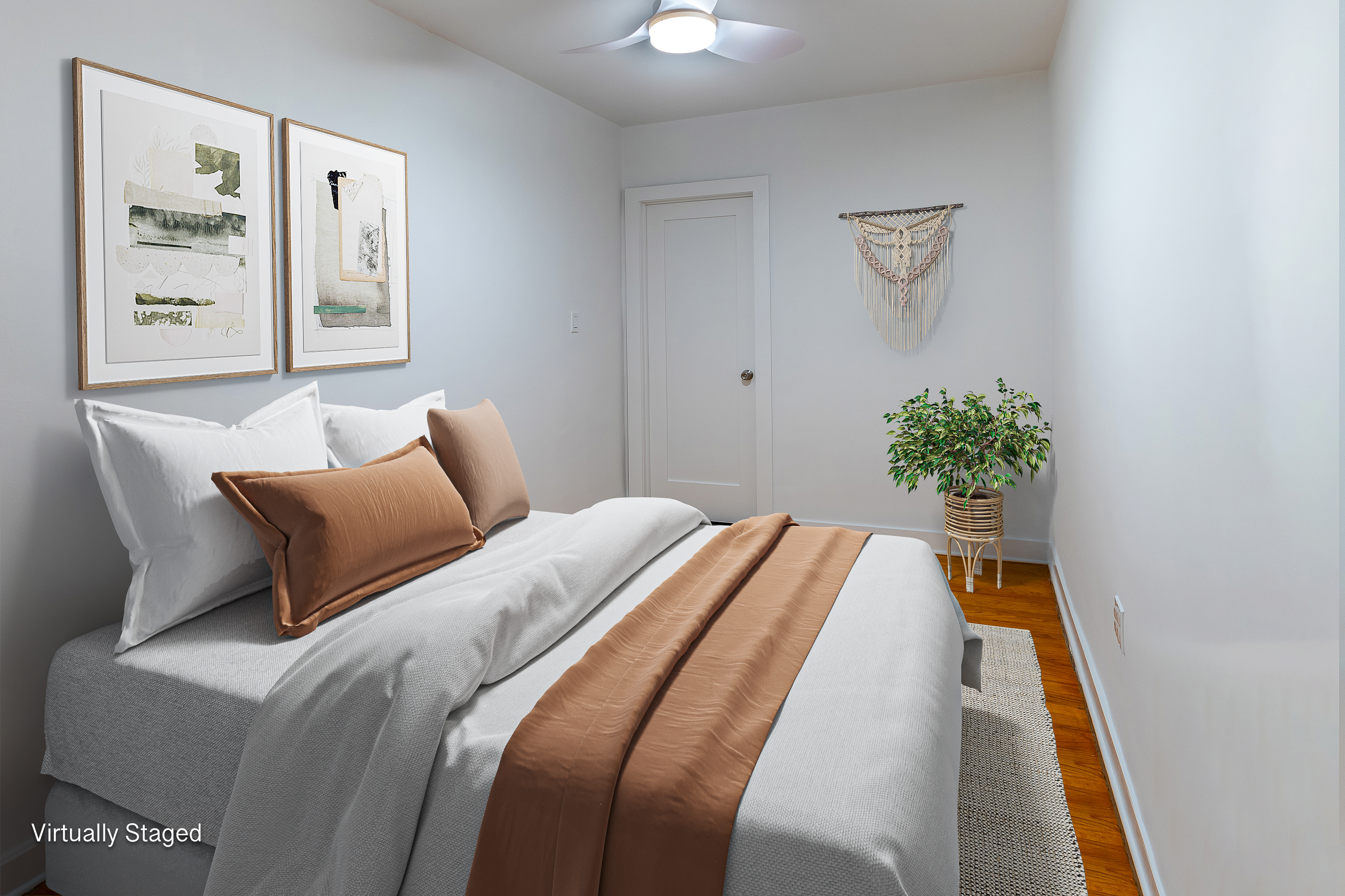 60 Plaza Street East, Unit 1G Brooklyn, NY 11238 - Photo 3 of 13 a bedroom with bed and wooden floor