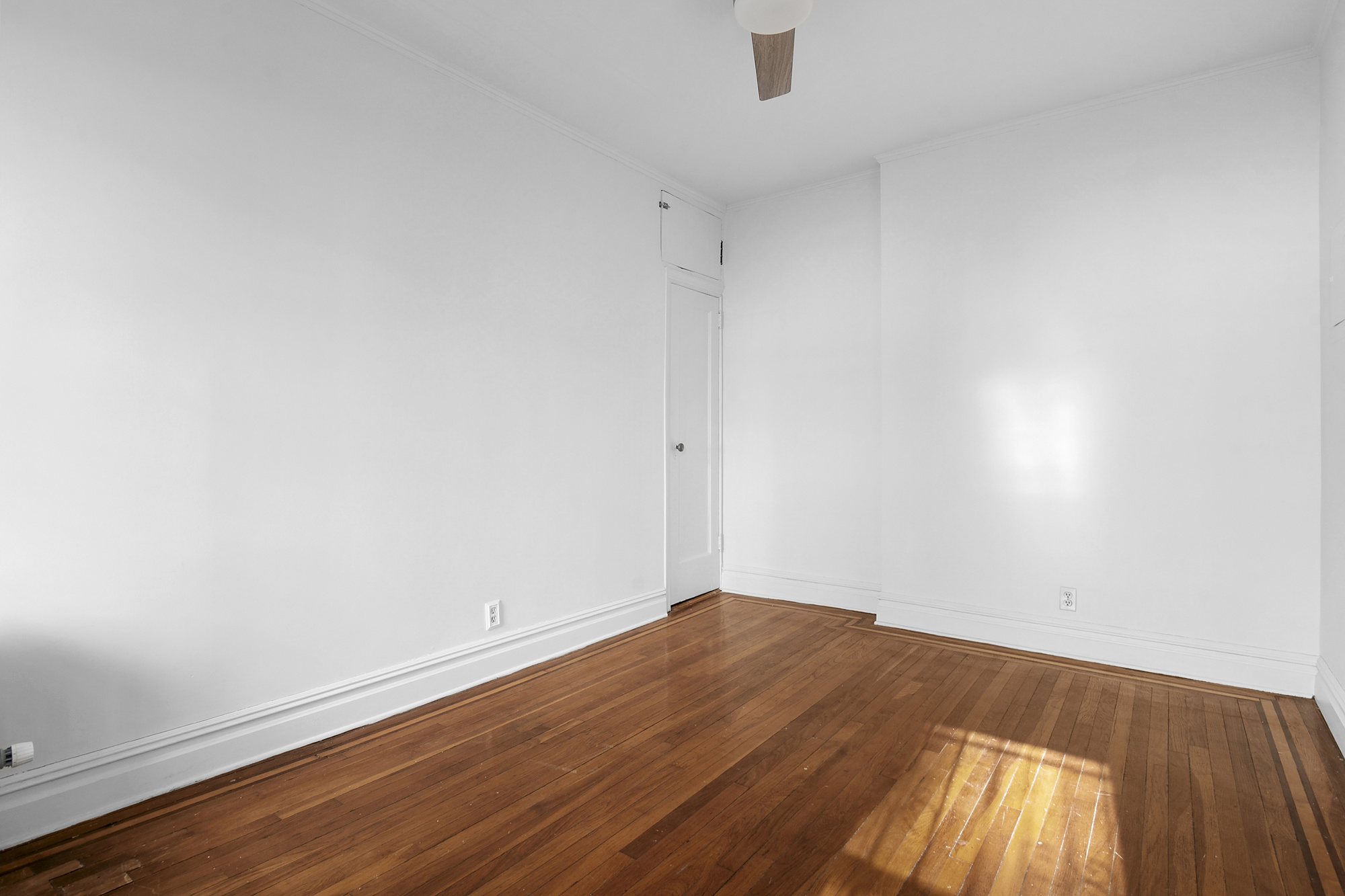 264 6th Avenue, Unit 1C Brooklyn, NY 11215 - Photo 9 of 11 a view of empty room with wooden floor
